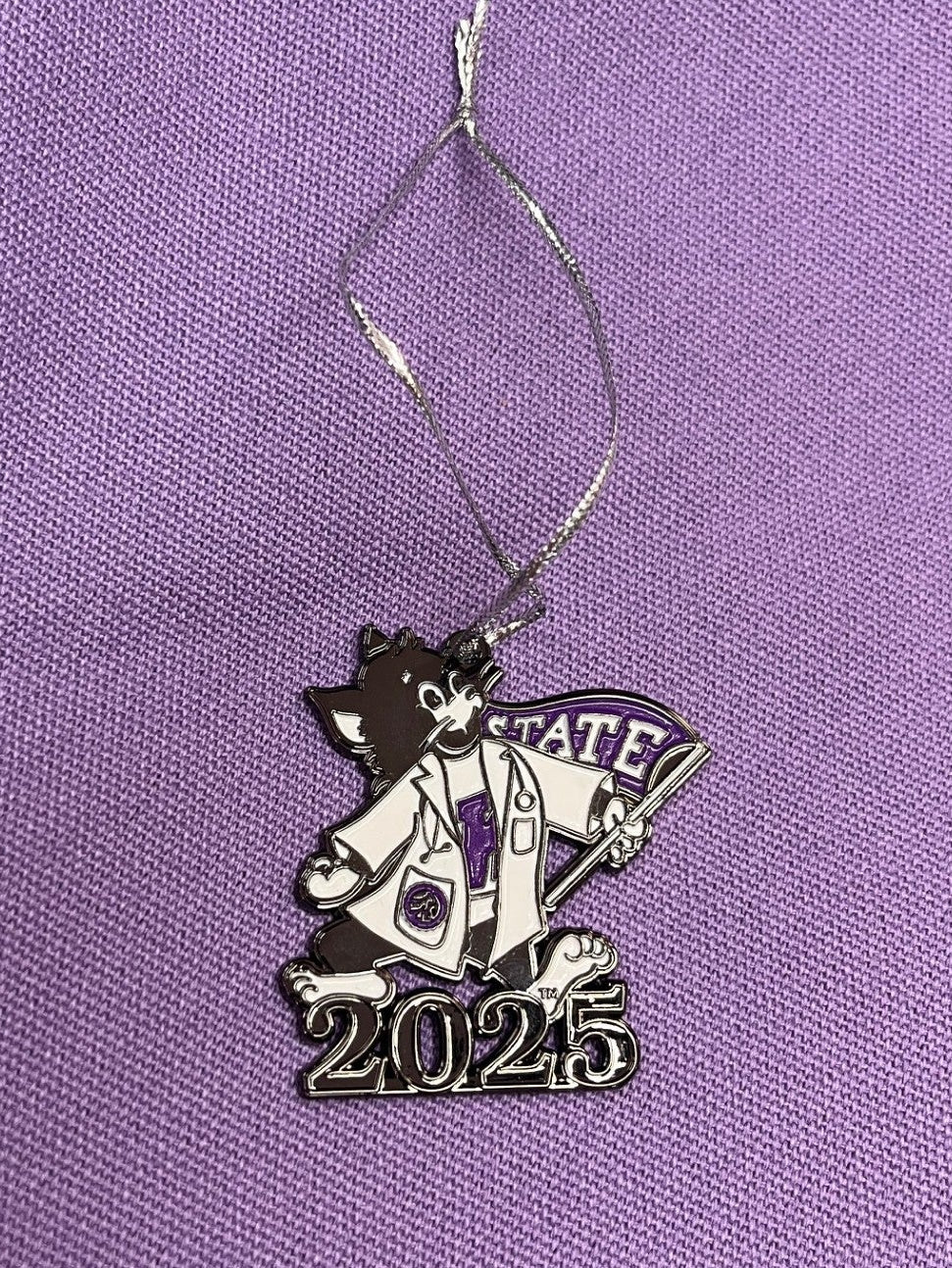 Metallic ornament with '2025' text on a purple Labcoat Willie design. 
