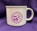 White mug with a purple Kansas State University College of Veterinary Medicine logo against a purple background.