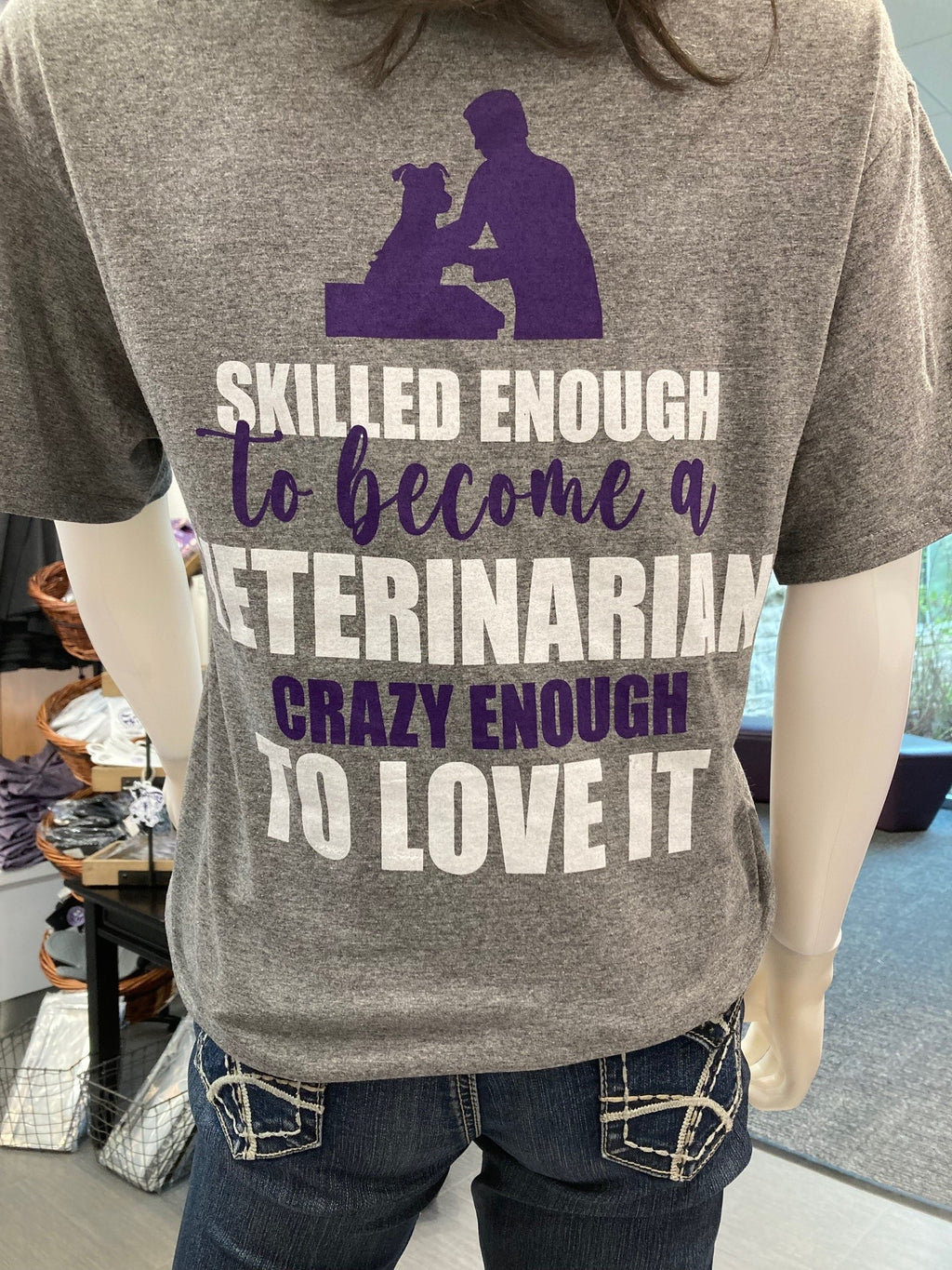 The back of the 2024 graduation shirt that reads "skilled enough to become a veterinarian crazy enough to love it" 