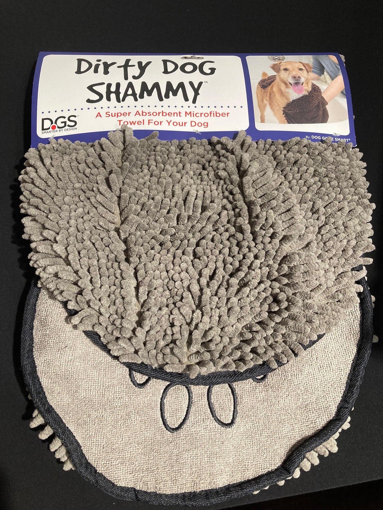 Packaged Dirty Dog Shammy dog towel in gray color with its branding visible on the packaging.