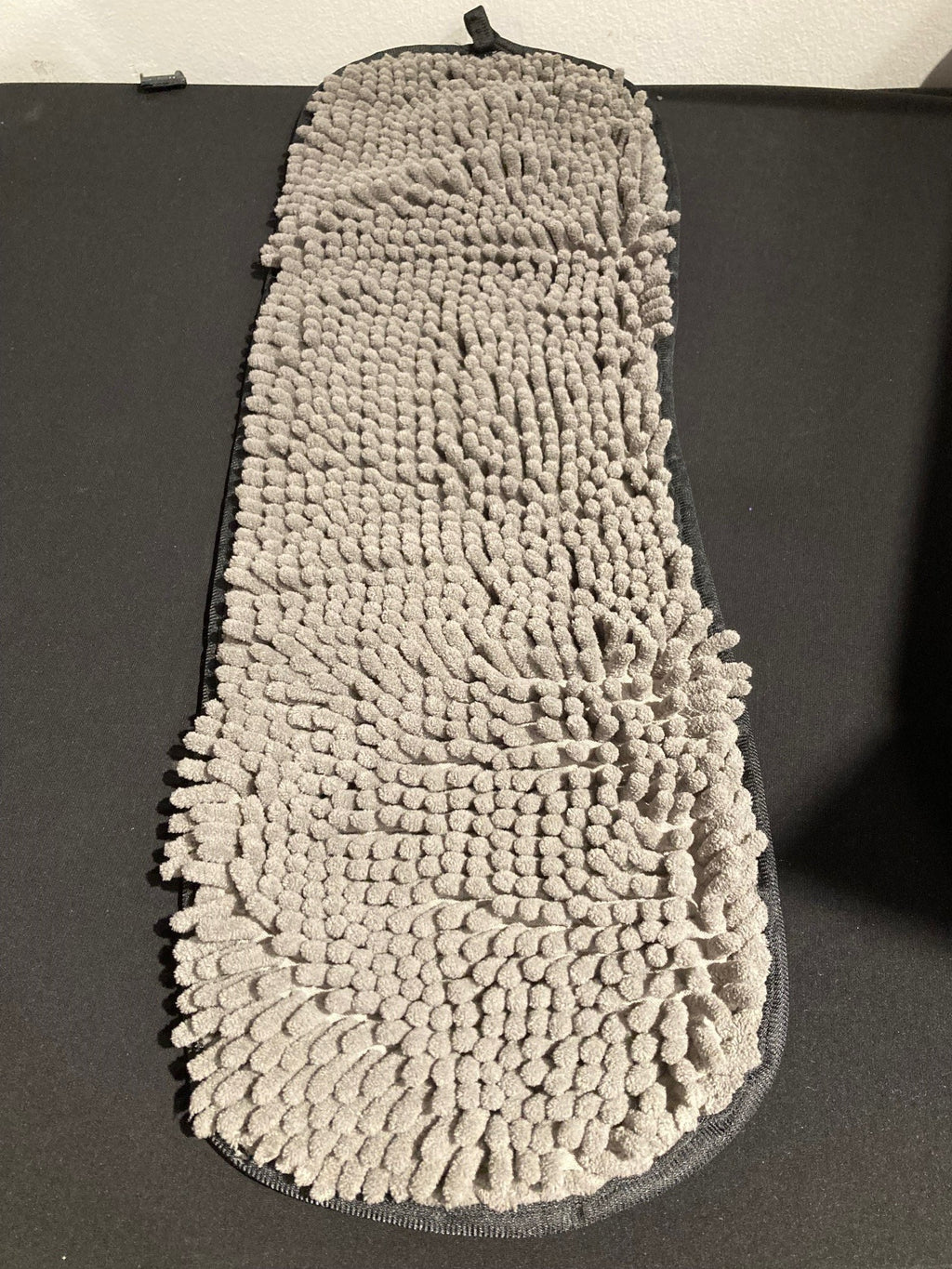 The dirty dog shammy unraveled to show the textured towel lining. 