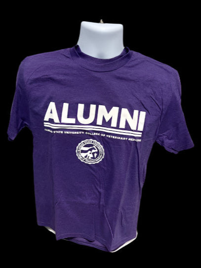 A dark purple district alumni t-shirt with white lettering and a white CVM seal. 