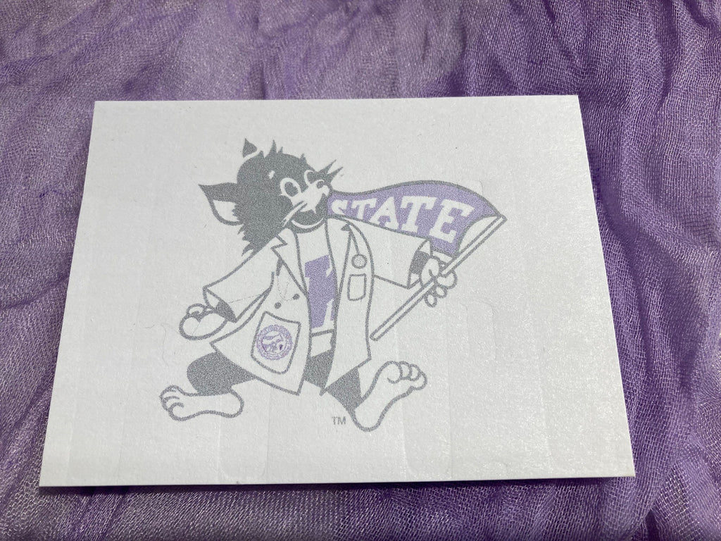 A customized sticky note pad with an illustration of Labcoat Willie. 