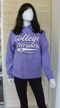 A hooded sweatshirt in amethyst color with 'College of Veterinary Medicine' printed on the front in white.