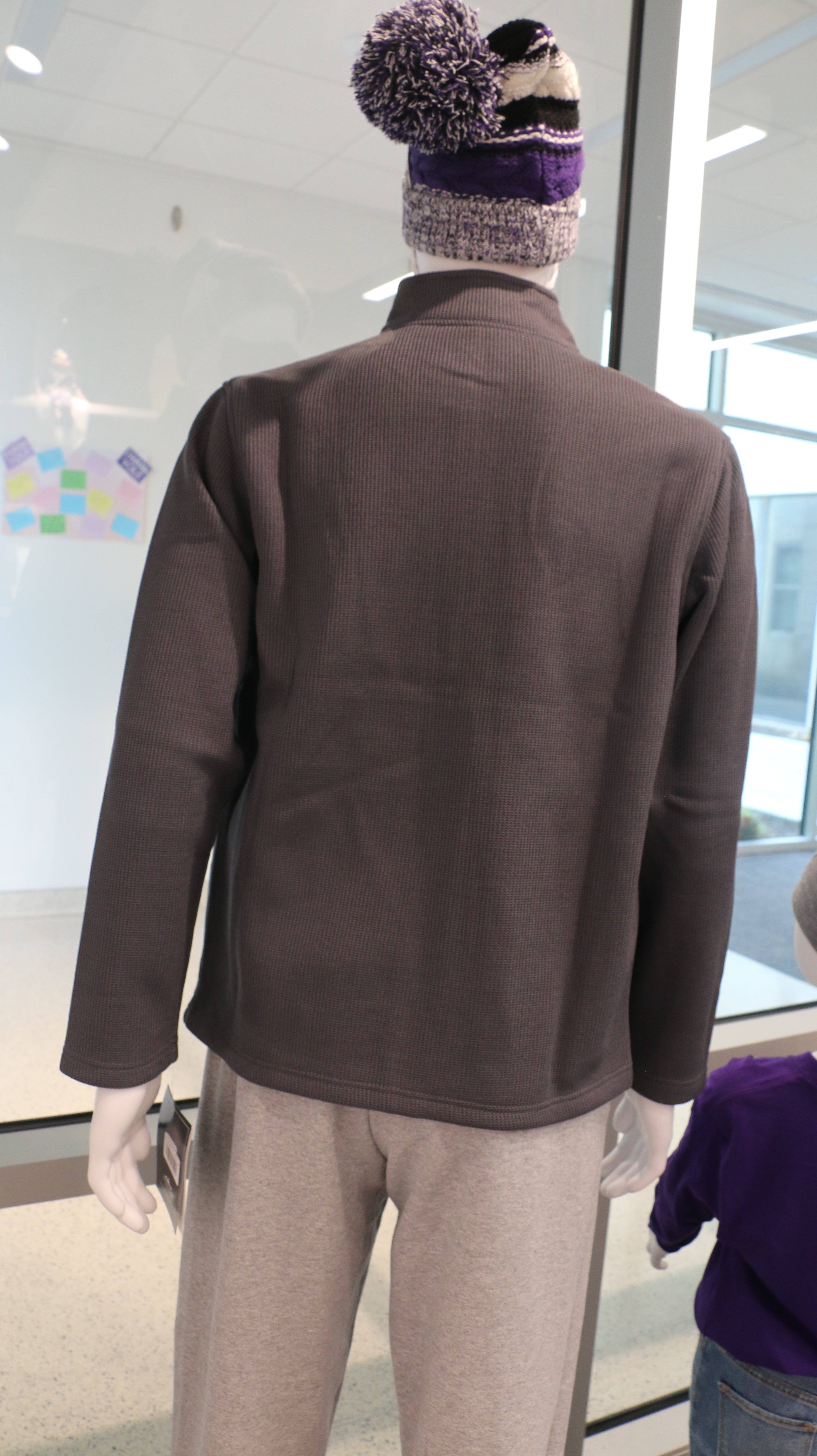 A rear view of the Charles River Heritage Rib Knit Jacket in the color gray. 