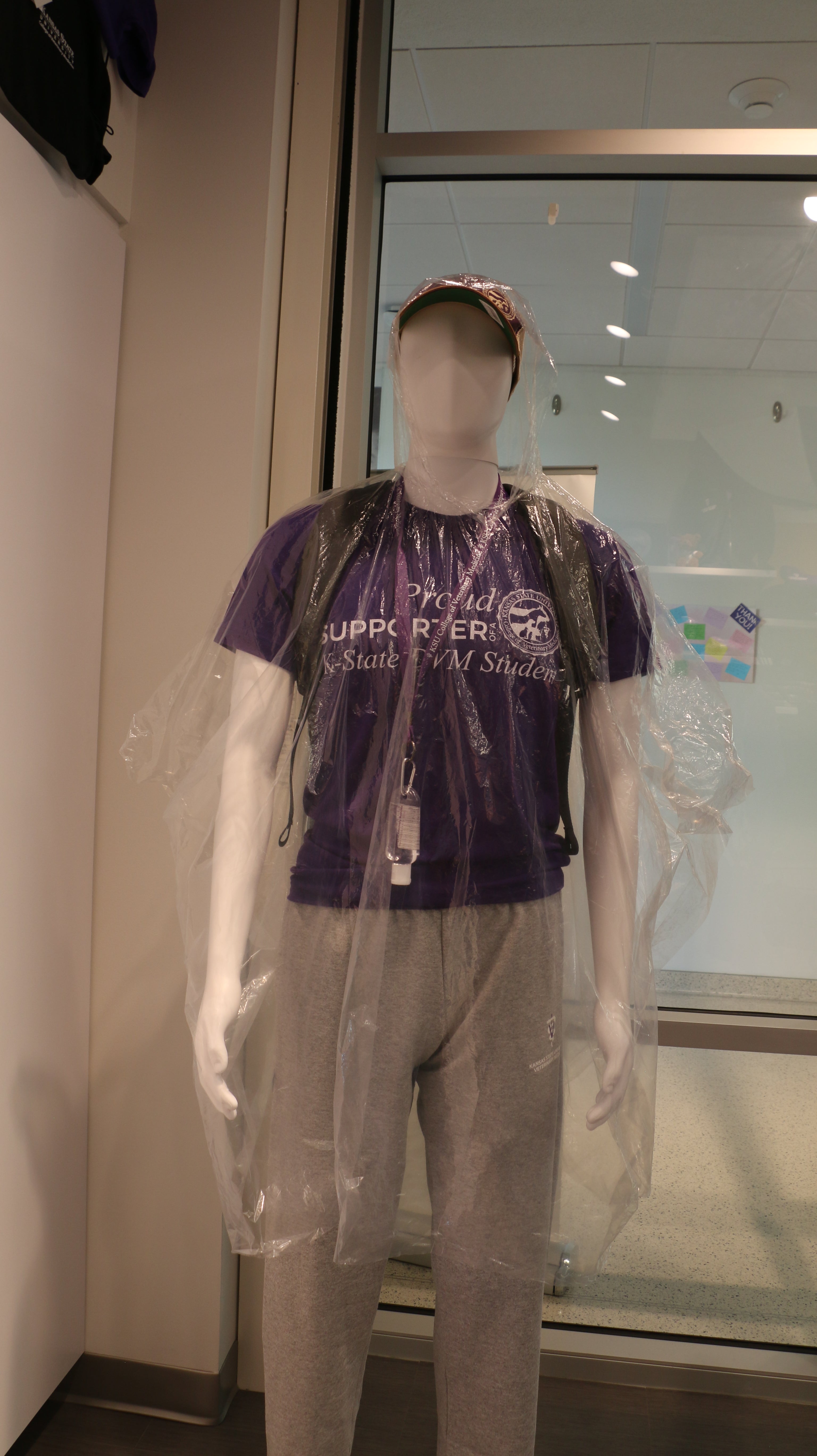 A clear disposable poncho with a hood. 
