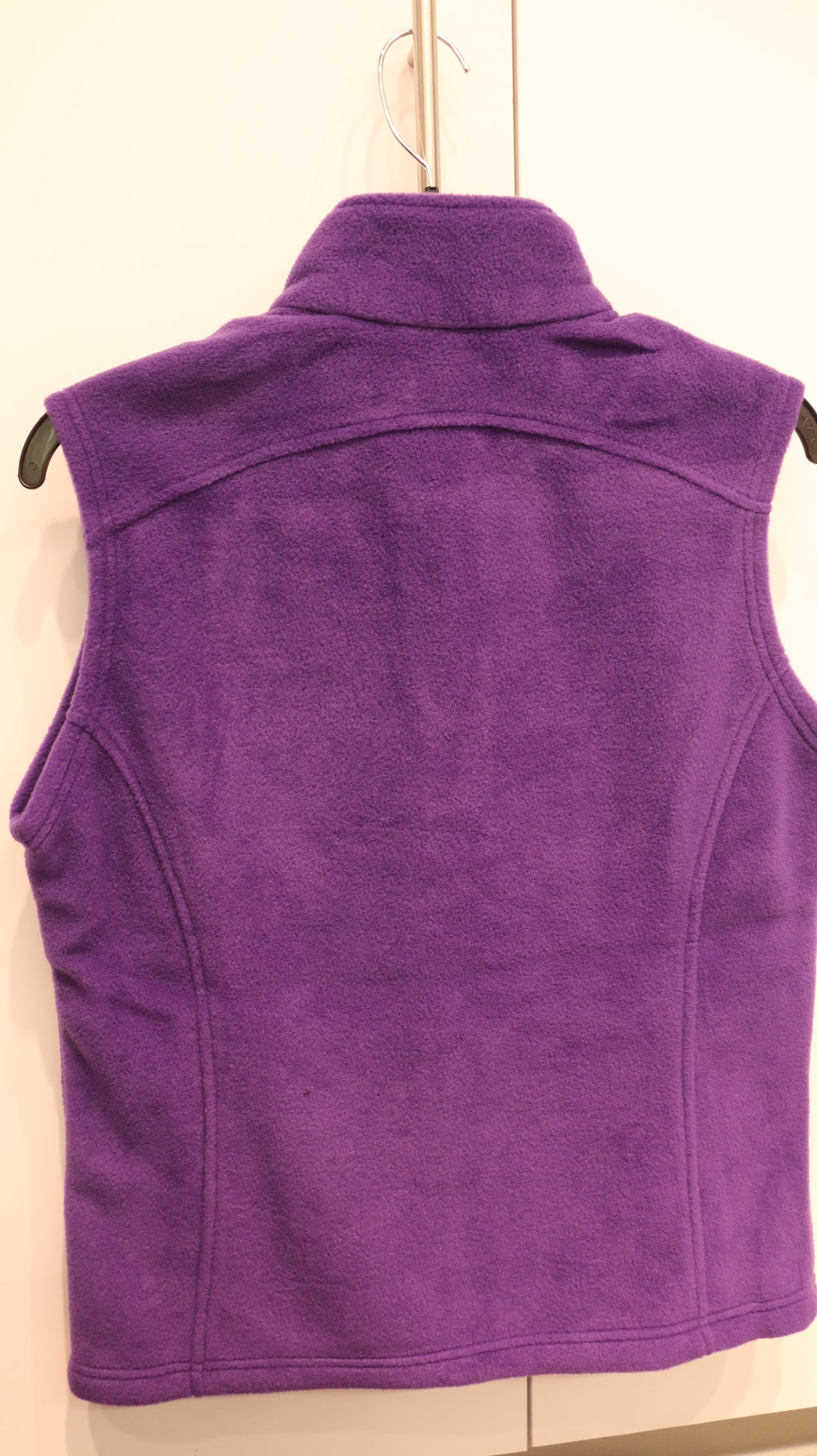A rear view of the purple vest. 