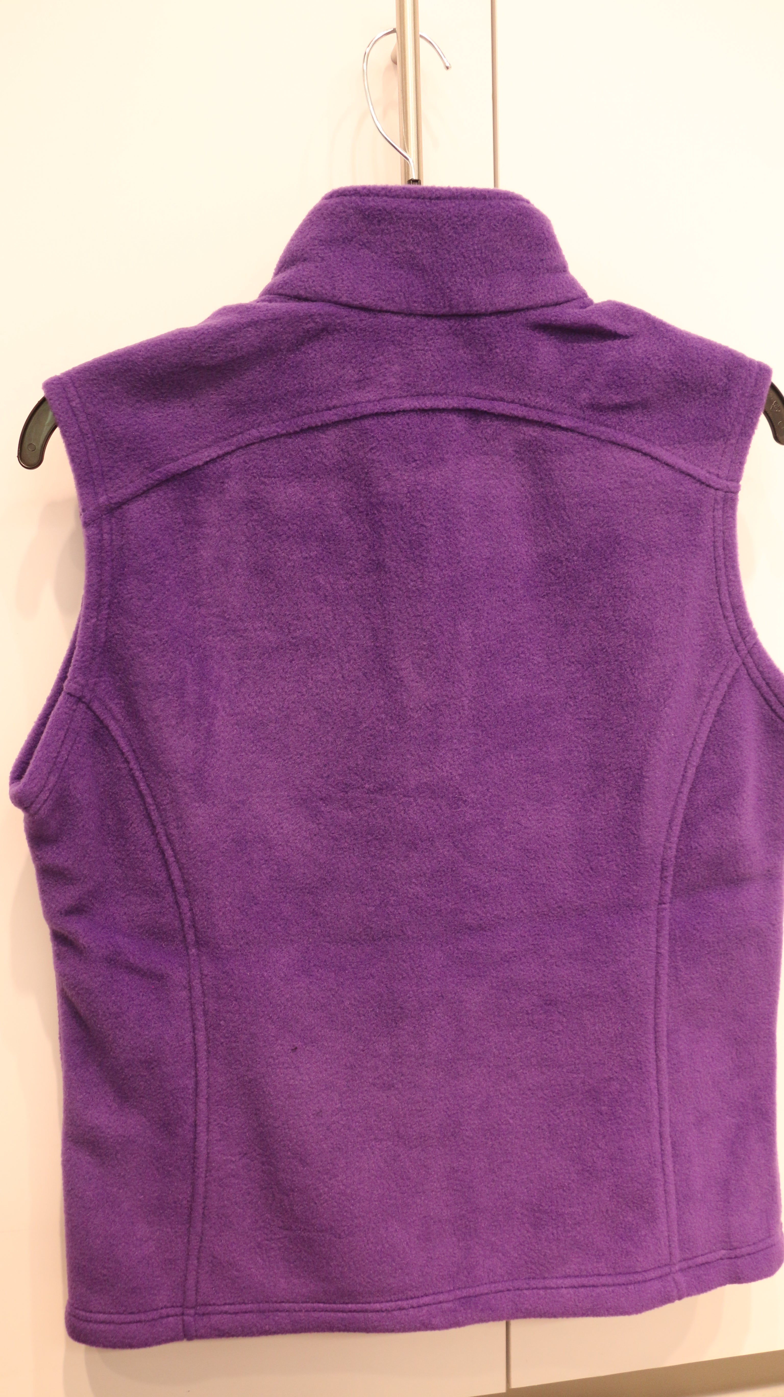 A rear view of the purple vest. 