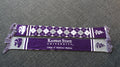A purple knit scarf with white and purple geometric patterns, K-State CVM logo.