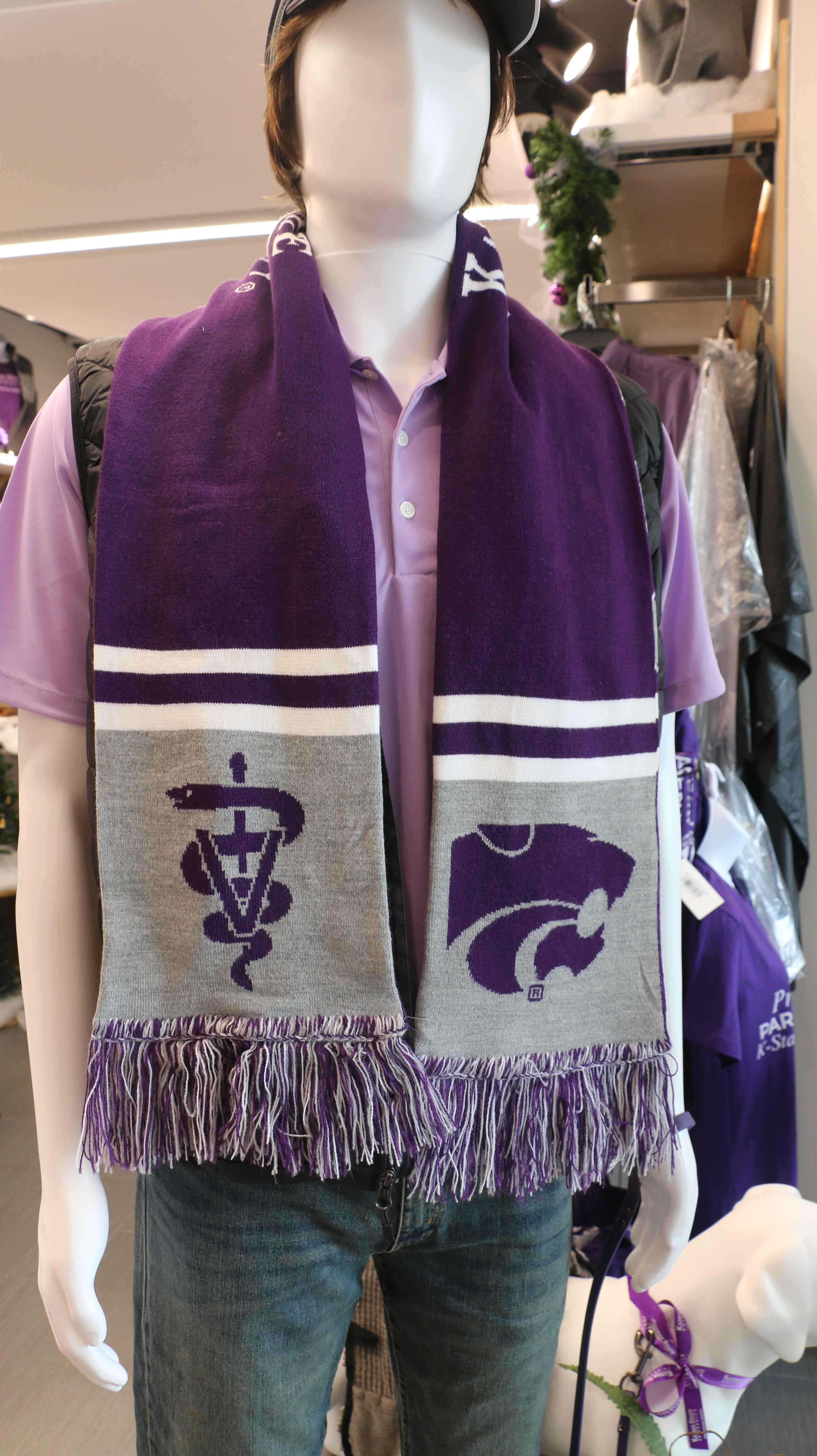 A purple knit scarf with white and purple geometric patterns, K-State CVM logo.