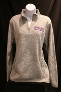 Heathered grey ladies quarter zip sweatshirt with side pockets and white CVM logo on the left chest area.