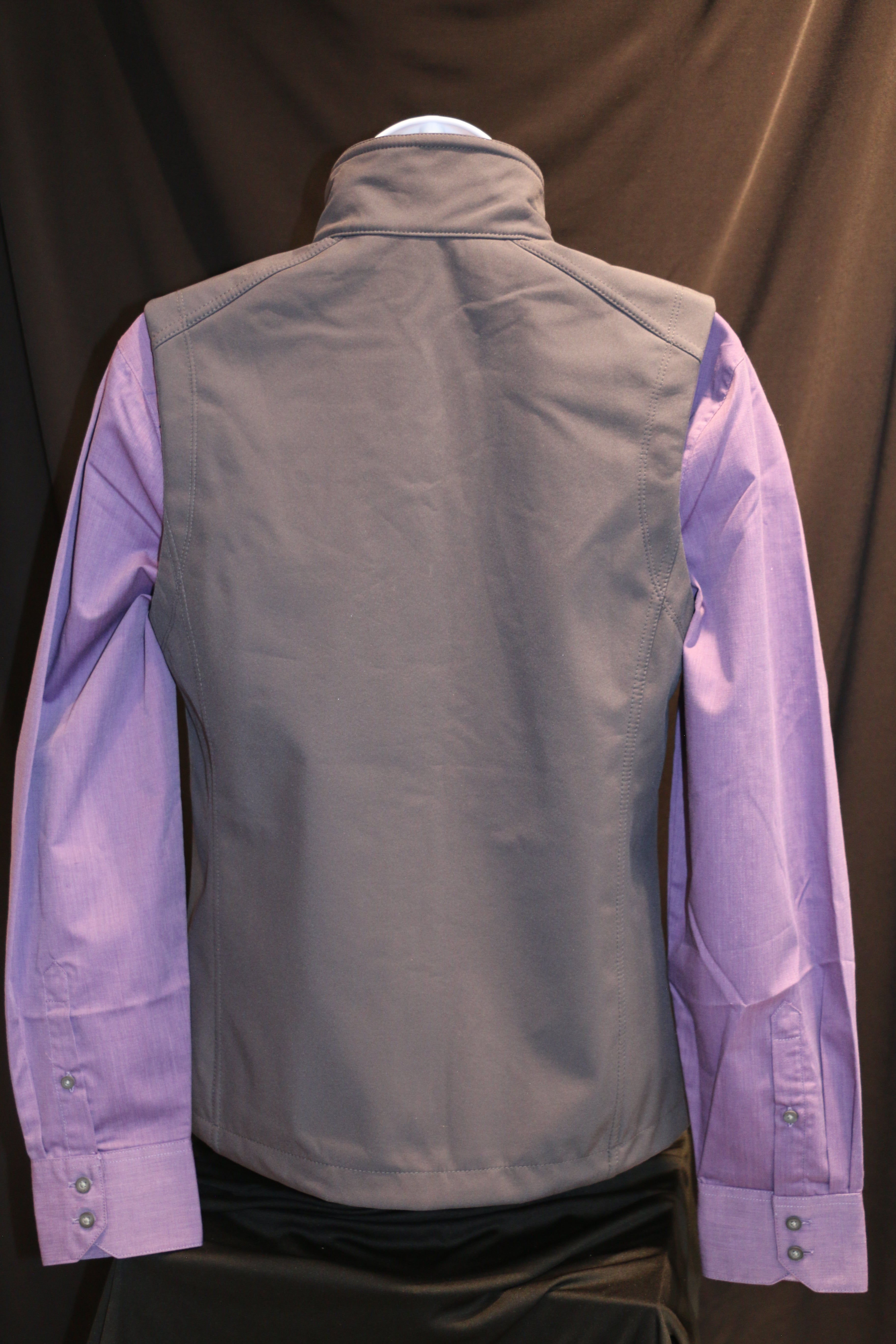 A rear view of the gray Port Authority lightweight vest for ladies.