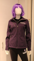 A purple Port Authority soft shell zip up jacket with side zip pockets, white CVM logo, and displayed on a mannequin.