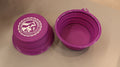 A 32oz purple collapsible silicone pet bowl displayed open and empty with a white College of Veterinary Medicine logo in the center. 