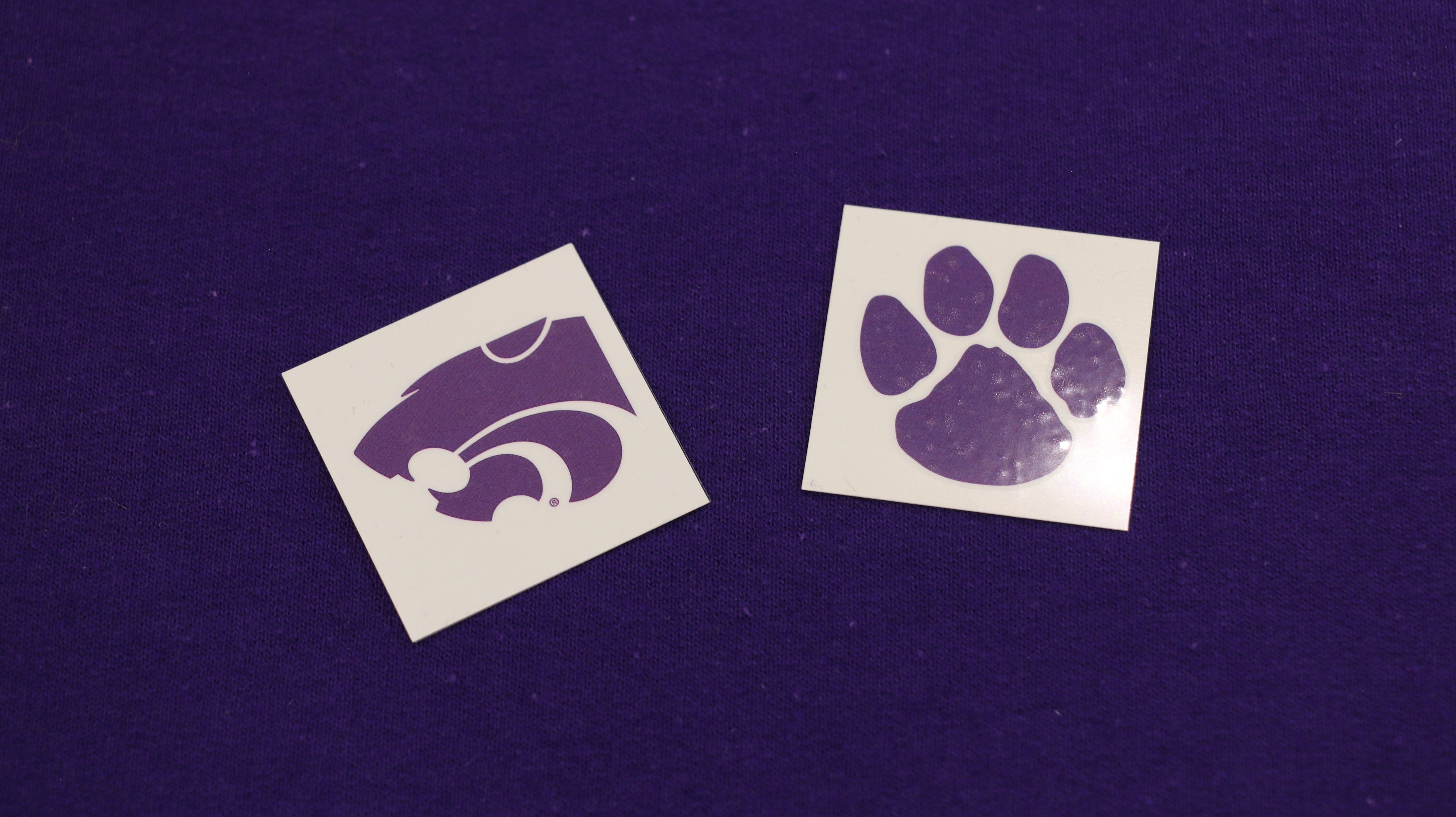 Temporary PowerCat and Paw purple tattoos. 