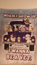 Baby blanket with different animals in the back of a truck and text 'When I Grow Up I Wanna Be a Vet' on a blue background.